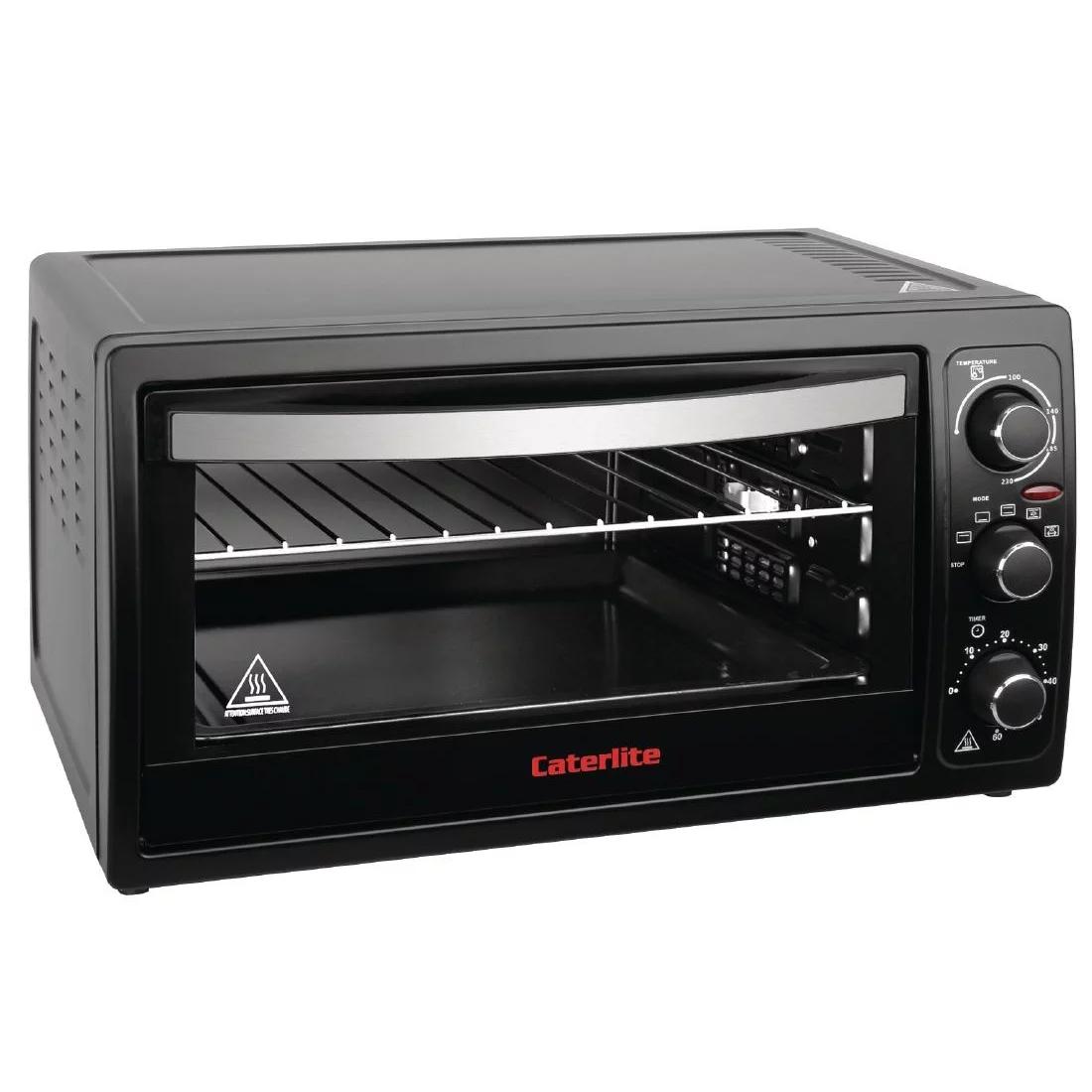 Mini oven with clearance rotisserie